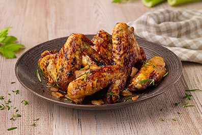 Alitas de pollo con ajillo y hierbas