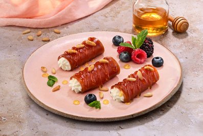 Canelón de membrillo y mousse de requesón