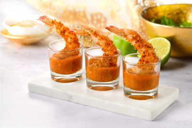 Aperitiu de llagostí amb pa de romesco 